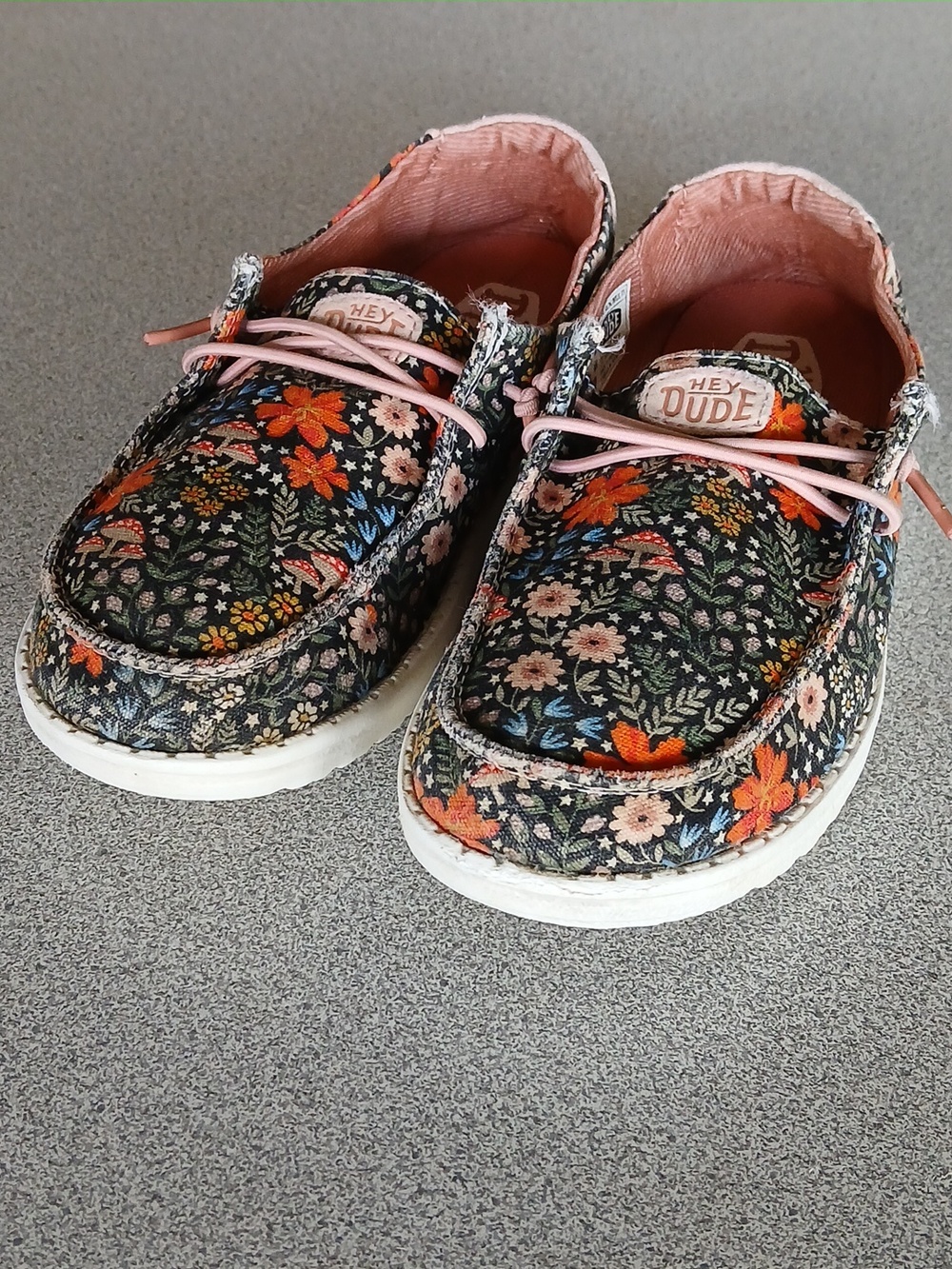 Hey Dude Floral Canvas Slip-Ons in Black, Pink & Orange